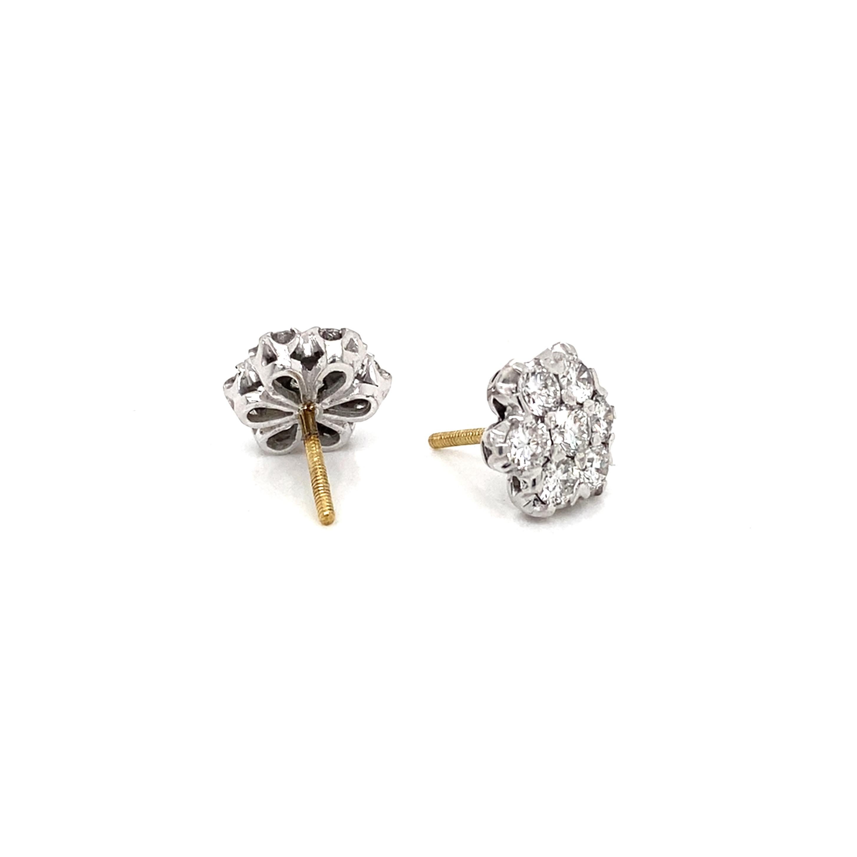 You can never go wrong with a classic pair of diamond cluster stud earrings.

Lovely and beautiful, these timeless studs are elegantly designed to resemble a delicate daisy flower. Each earring is exquisitely set with 7 dazzling round brilliant cut