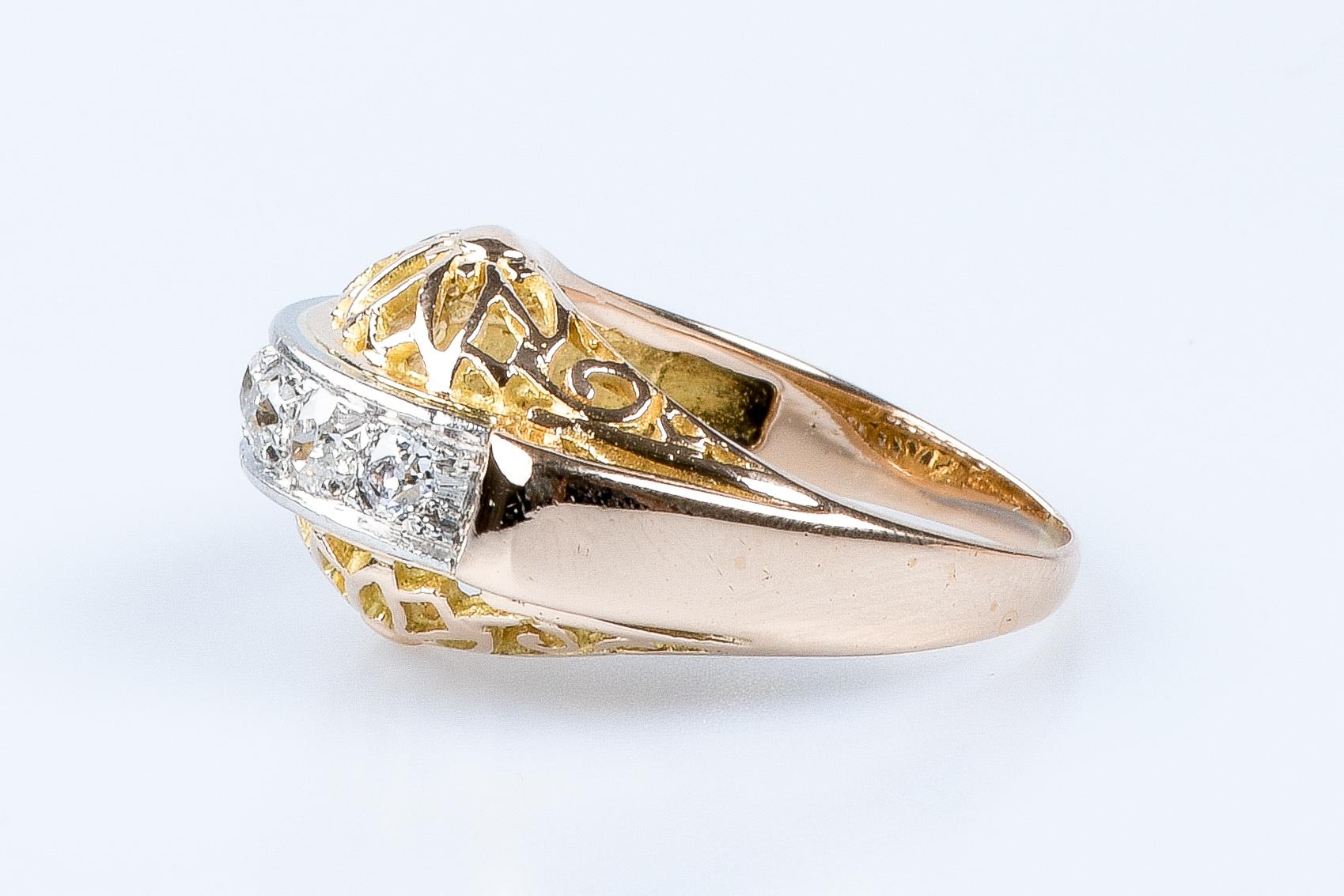 For Sale:  18 carat yellow and white gold ring designed with 5 round brillant cut diamonds 10