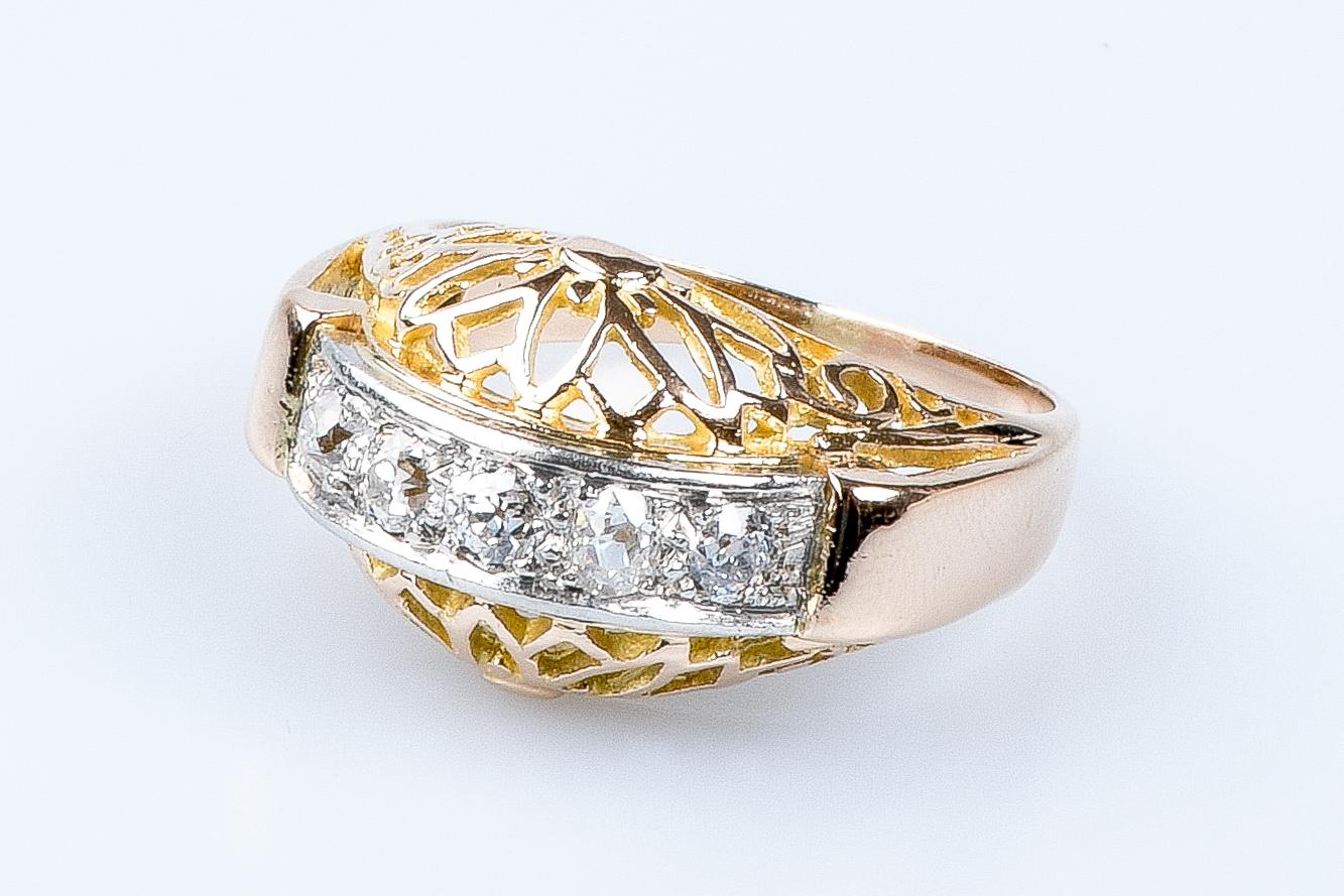 For Sale:  18 carat yellow and white gold ring designed with 5 round brillant cut diamonds 11