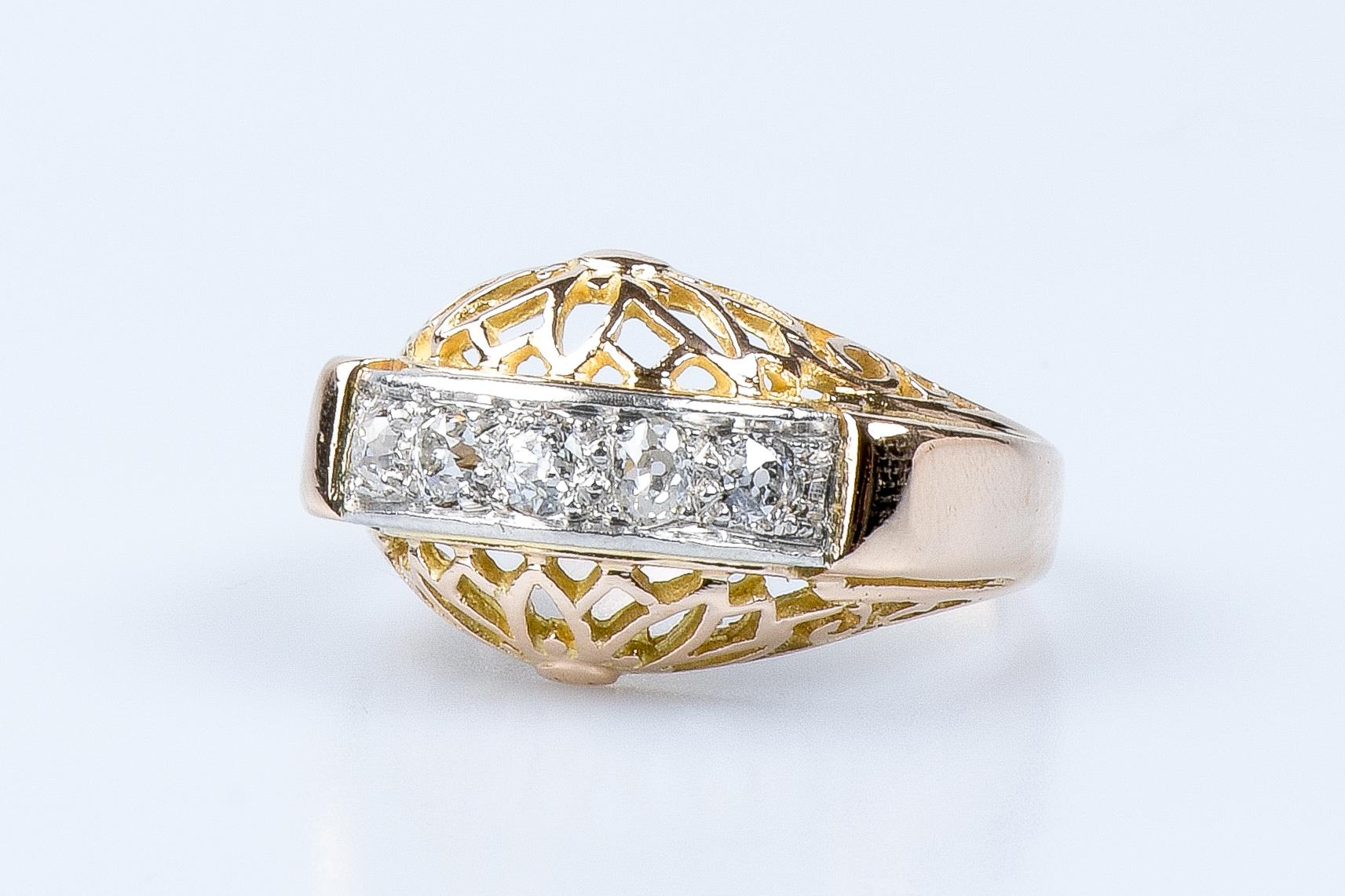 For Sale:  18 carat yellow and white gold ring designed with 5 round brillant cut diamonds 13