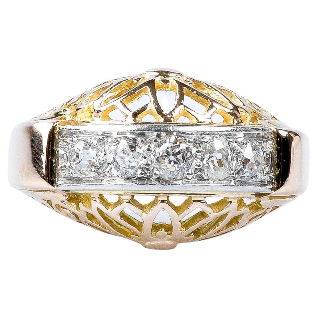 For Sale:  18 carat yellow and white gold ring designed with 5 round brillant cut diamonds