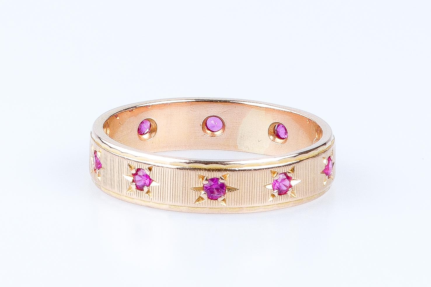 Women's 18 carat yellow gold alliance designed with 10 round rubies weighing 0.20 carat