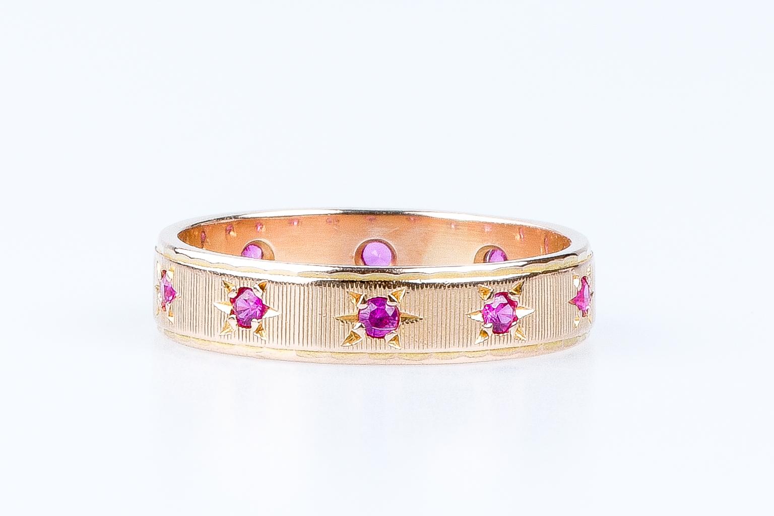 18 carat yellow gold alliance designed with 10 round rubies weighing 0.20 carat 3