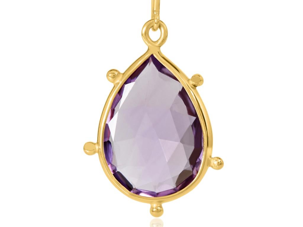 18 Carat Yellow Gold Amethyst Earrings

Esther Eyre has been designing and making precious jewellery for over twenty years. She trained at Kingston and Middlesex gaining a BA in jewellery design in 1982. Esther worked briefly in Mappin & Webb before