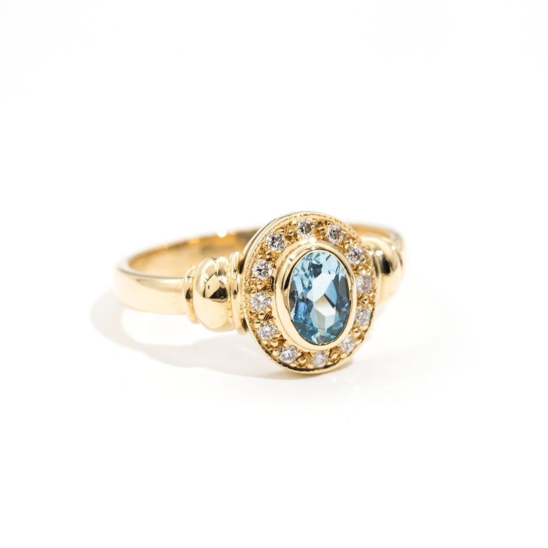 Contemporary 18 Carat Yellow Gold Aquamarine and Round Diamond Halo Vintage Cluster Ring