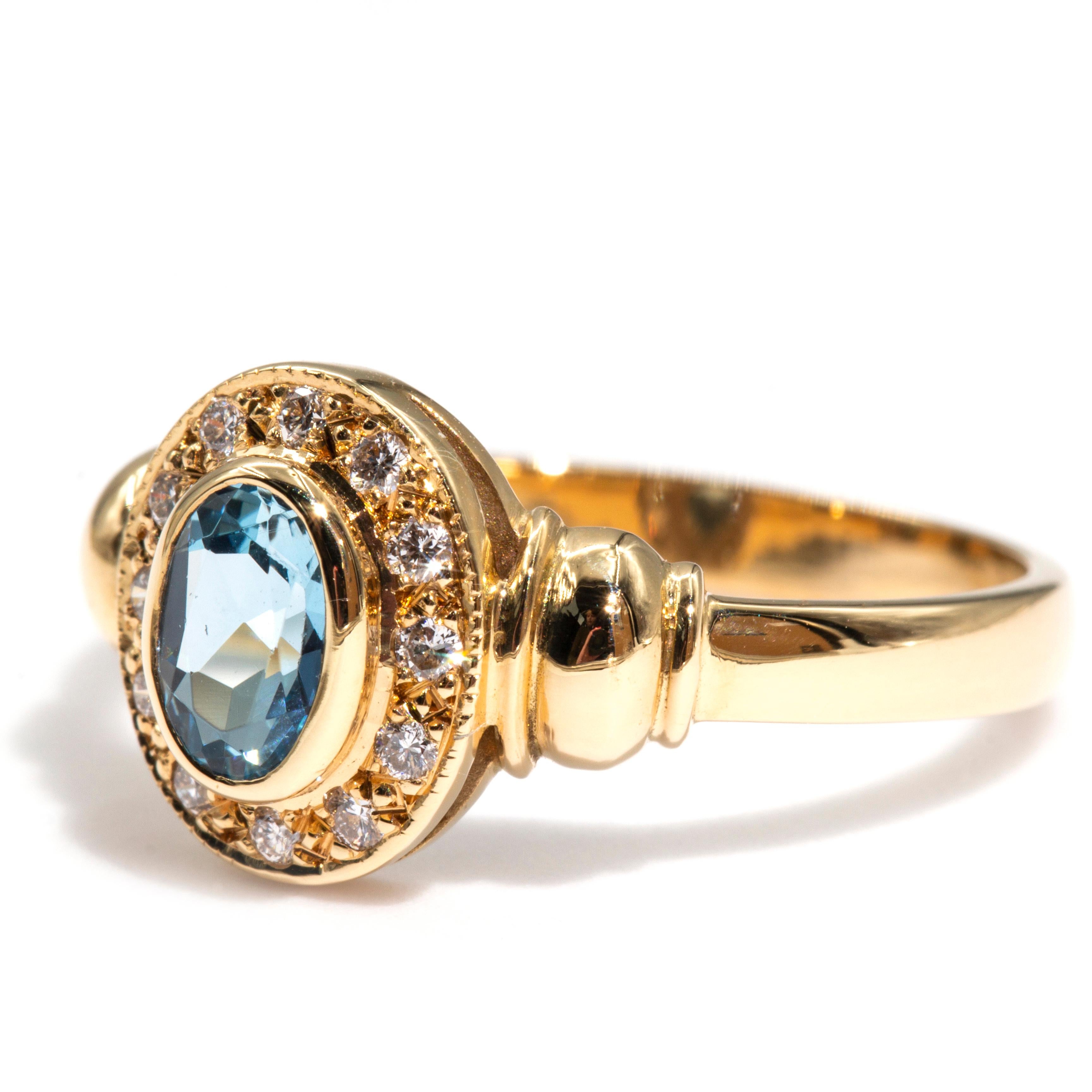 Oval Cut 18 Carat Yellow Gold Aquamarine and Round Diamond Halo Vintage Cluster Ring