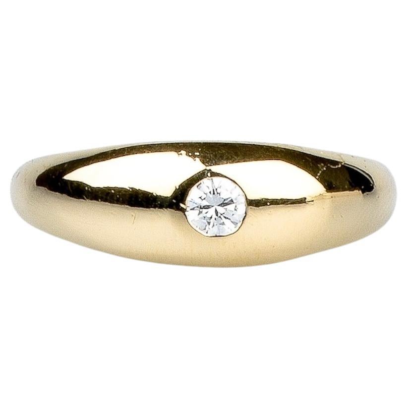 18 carat yellow gold band ring designed a round brilliant cut diamond For Sale