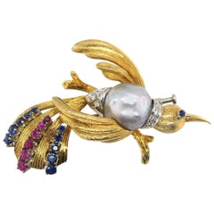 18 Carat Yellow Gold Bird Brooch with Sapphires, Rubies and Diamonds