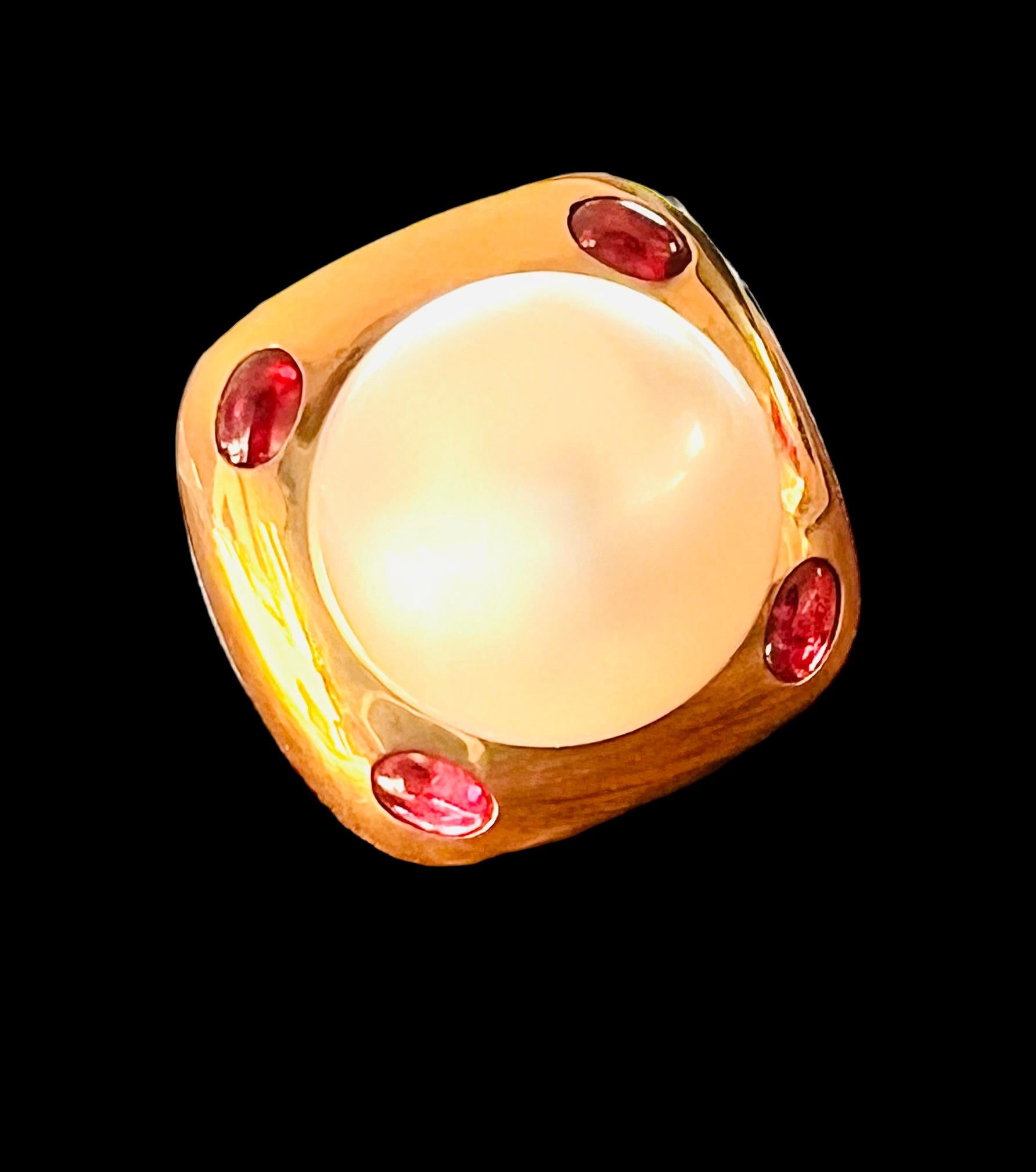 Women's 18 Carat Yellow Gold Cocktail Ring Set With A South Sea Pearl Ruby Cabochon