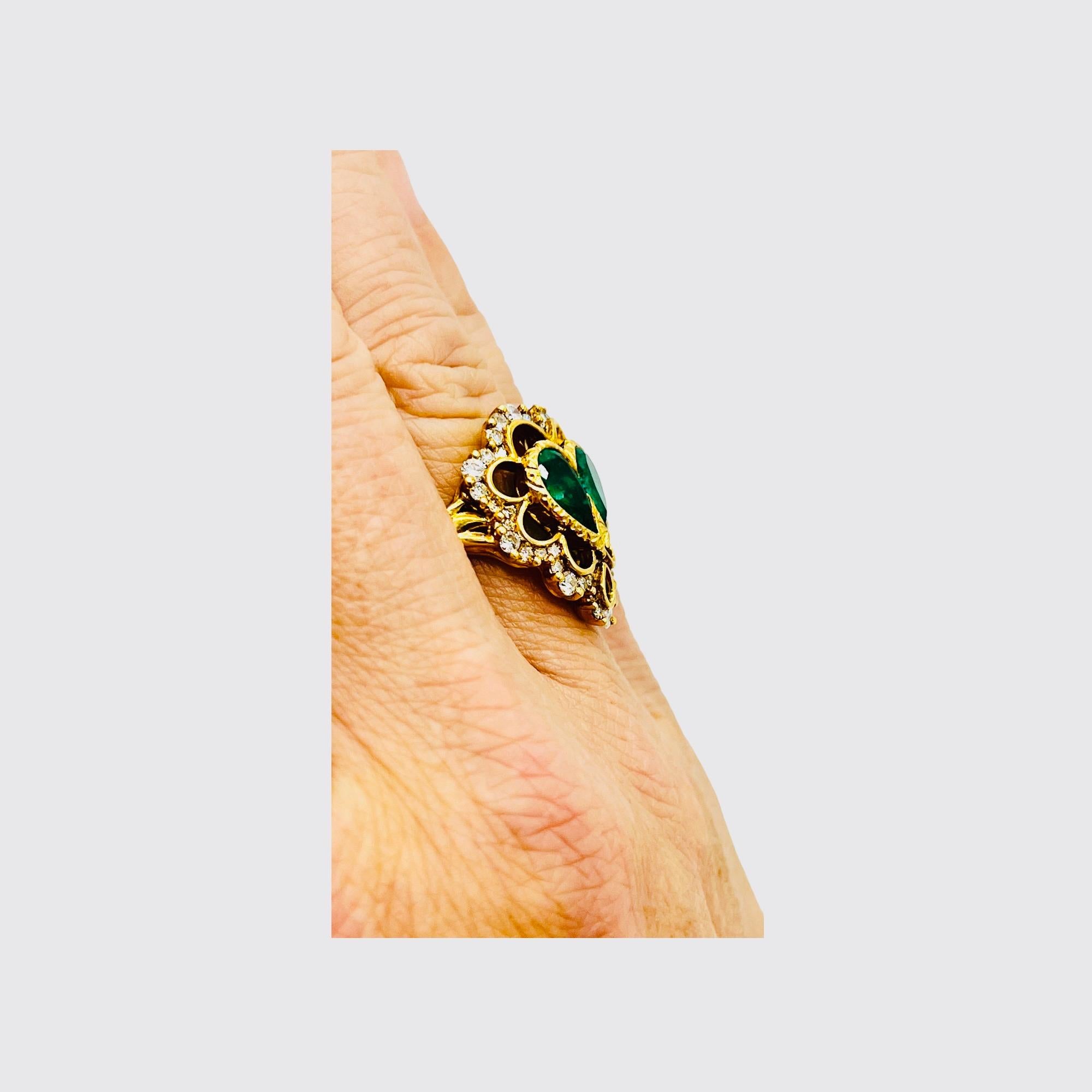 Emerald Cut 18-Carat Yellow Gold Cocktail Ring Set with Two Emeralds and Diamonds
