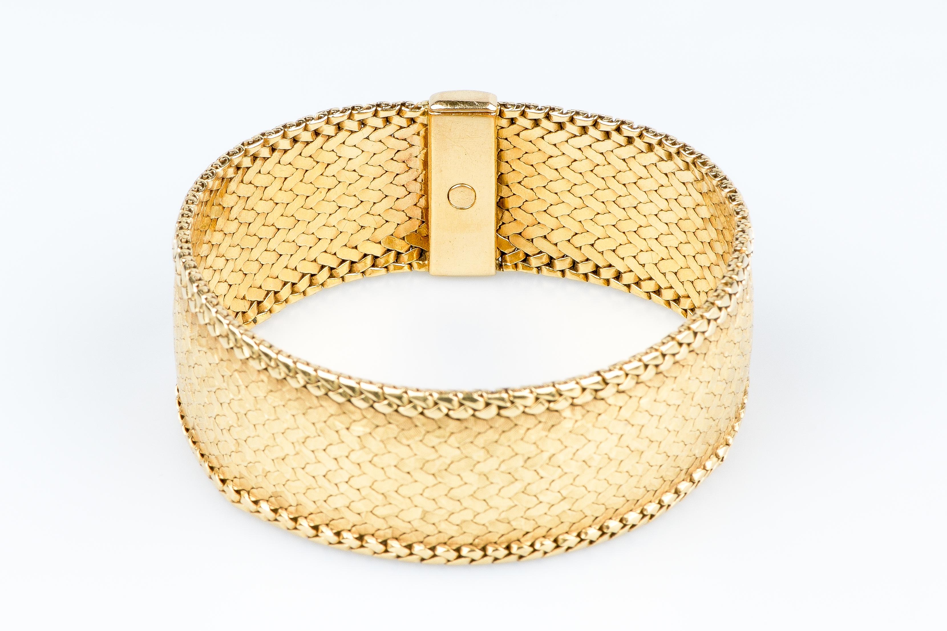 18 carat yellow gold cuff bracelet  12