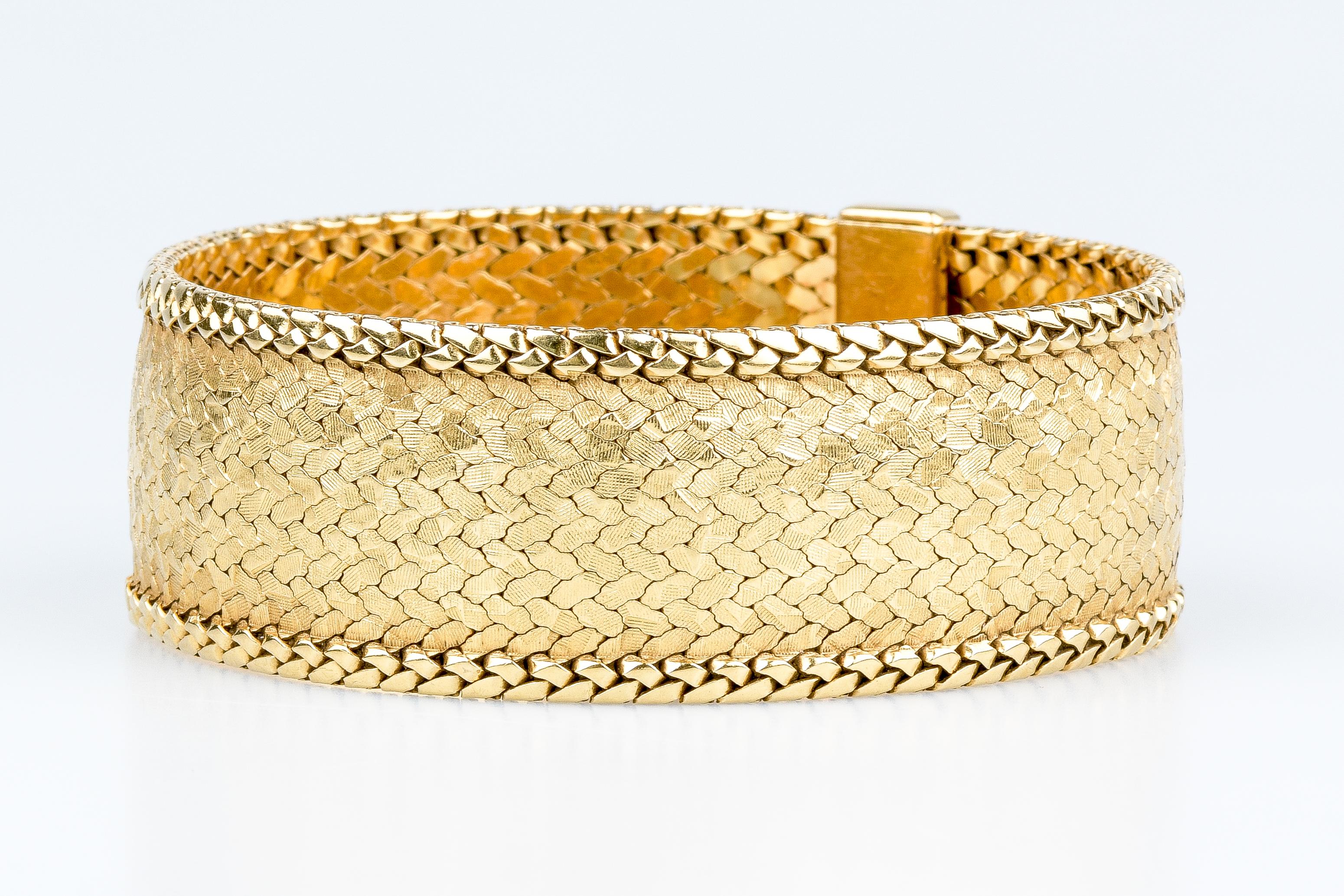 18 carat yellow gold cuff bracelet  14