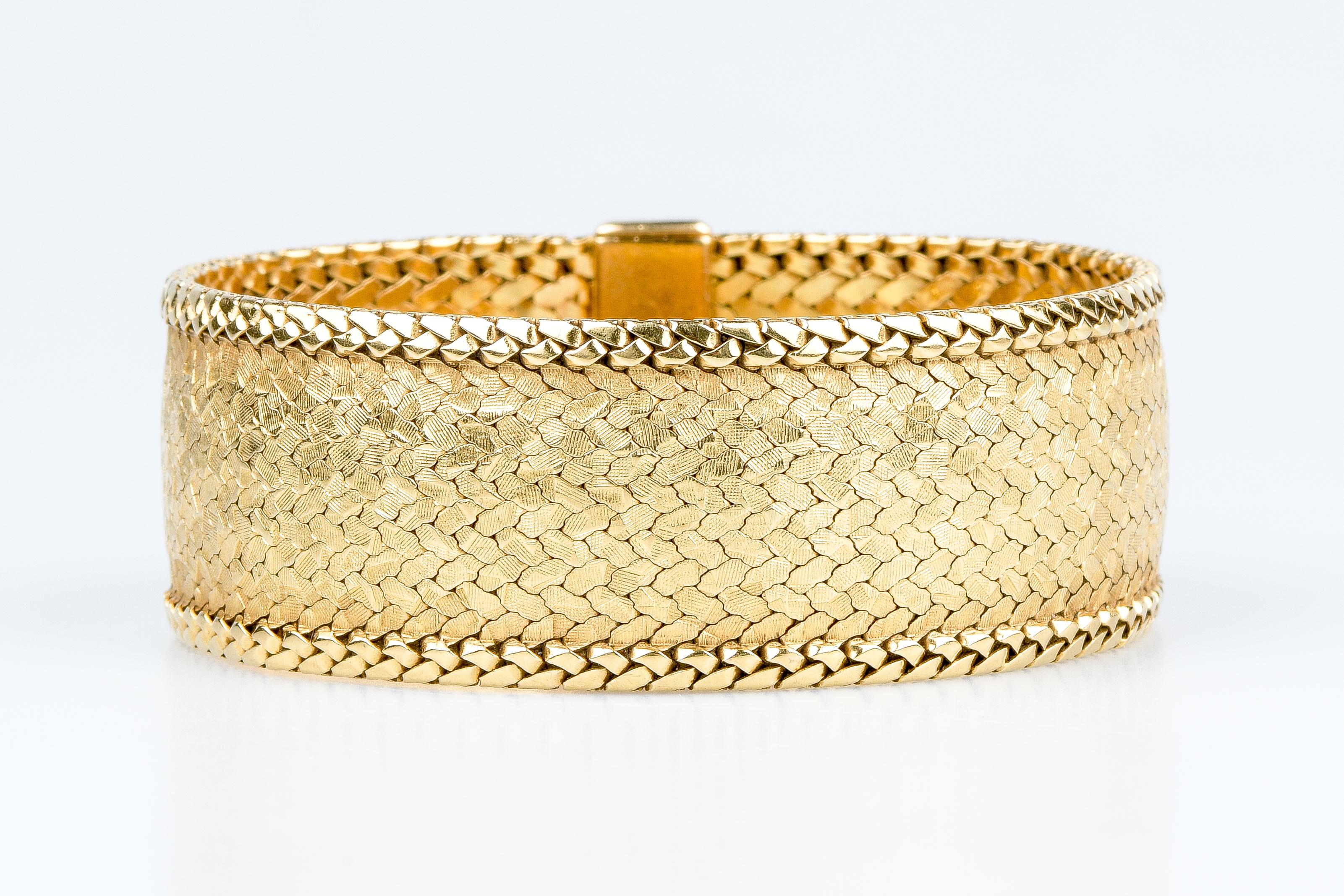 18 carat yellow gold cuff bracelet  15