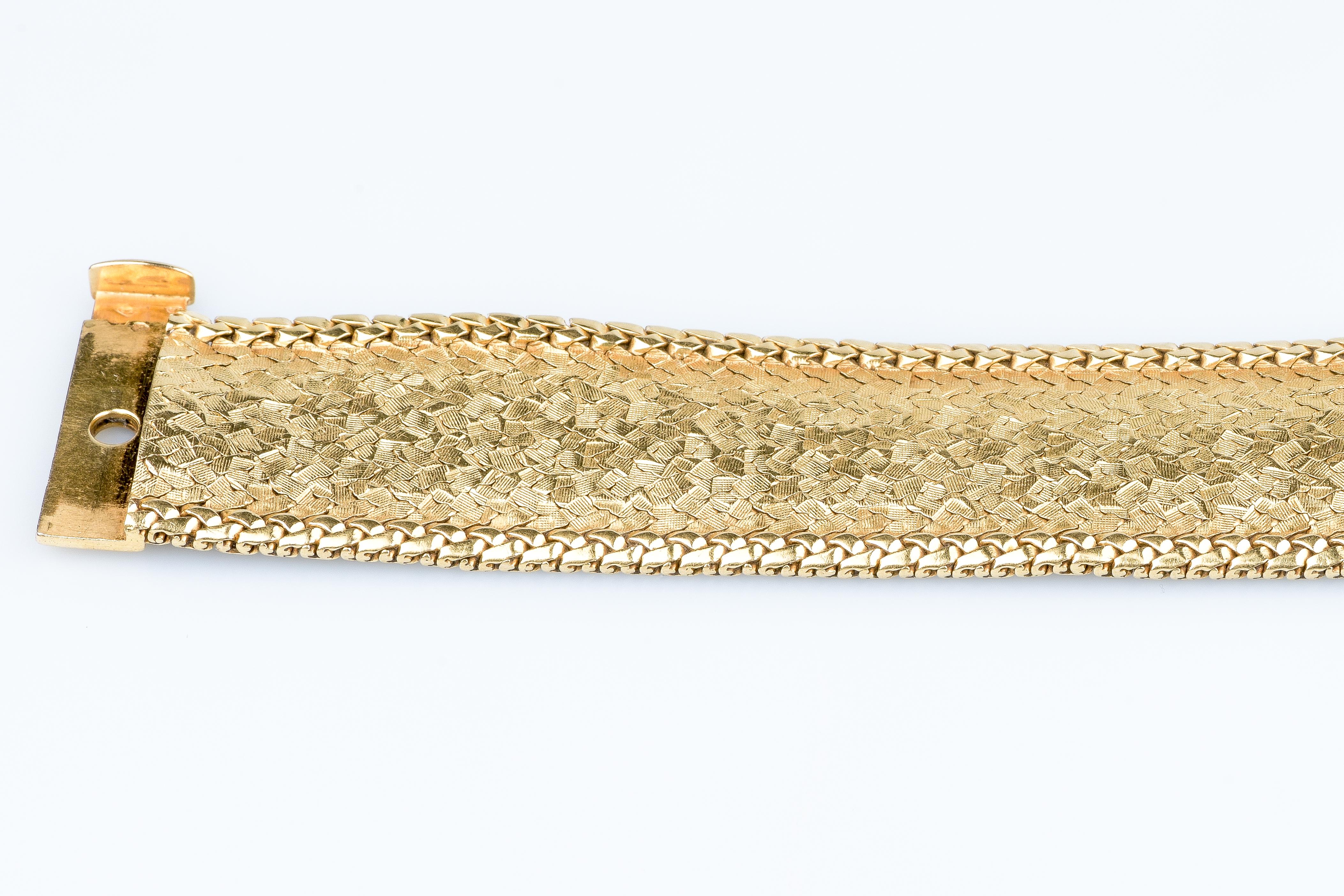 18 carat yellow gold cuff bracelet  16