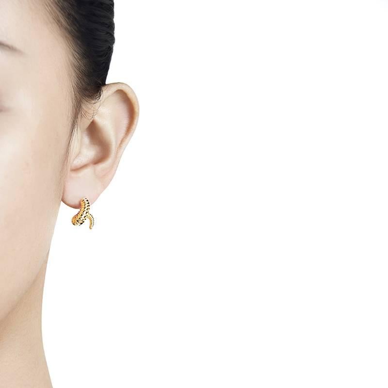 Playfull and charming these 18K gold danger earrings are something special. Handcrafted from the finest 18K gold. These earrings are a Mistova bestseller, easy to wear every day with a contemporary design.