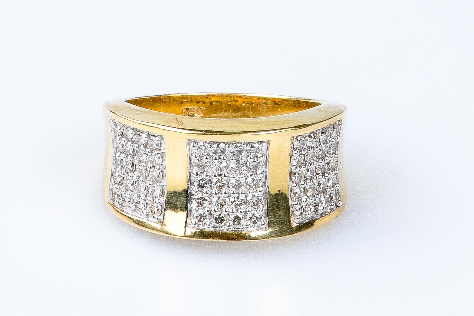 18 carat yellow gold ring designed with 60 brillant cut diamonds weighing 0.72 carats.

Quality of the diamond
Color : H
Clarity : SI

 Weight : 9.70 gr.

Size : EU : 53  - SP/IT : 13 - US : 6.5

Dimensions : 1.00 x 0.40 cm

Jewel delivered in a