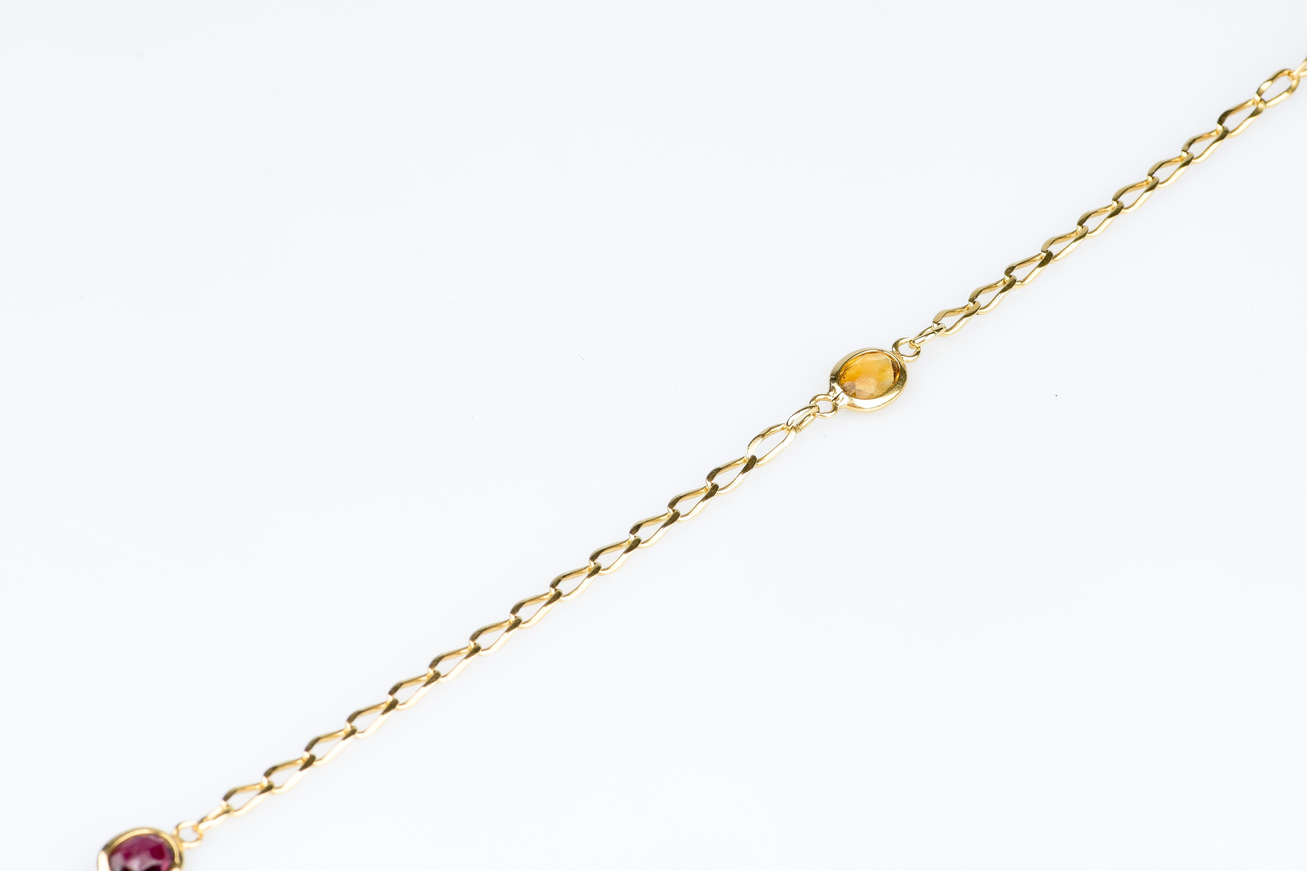 Women's  18 carat yellow gold double turn bracelet designed with 5 semi-precious stones For Sale