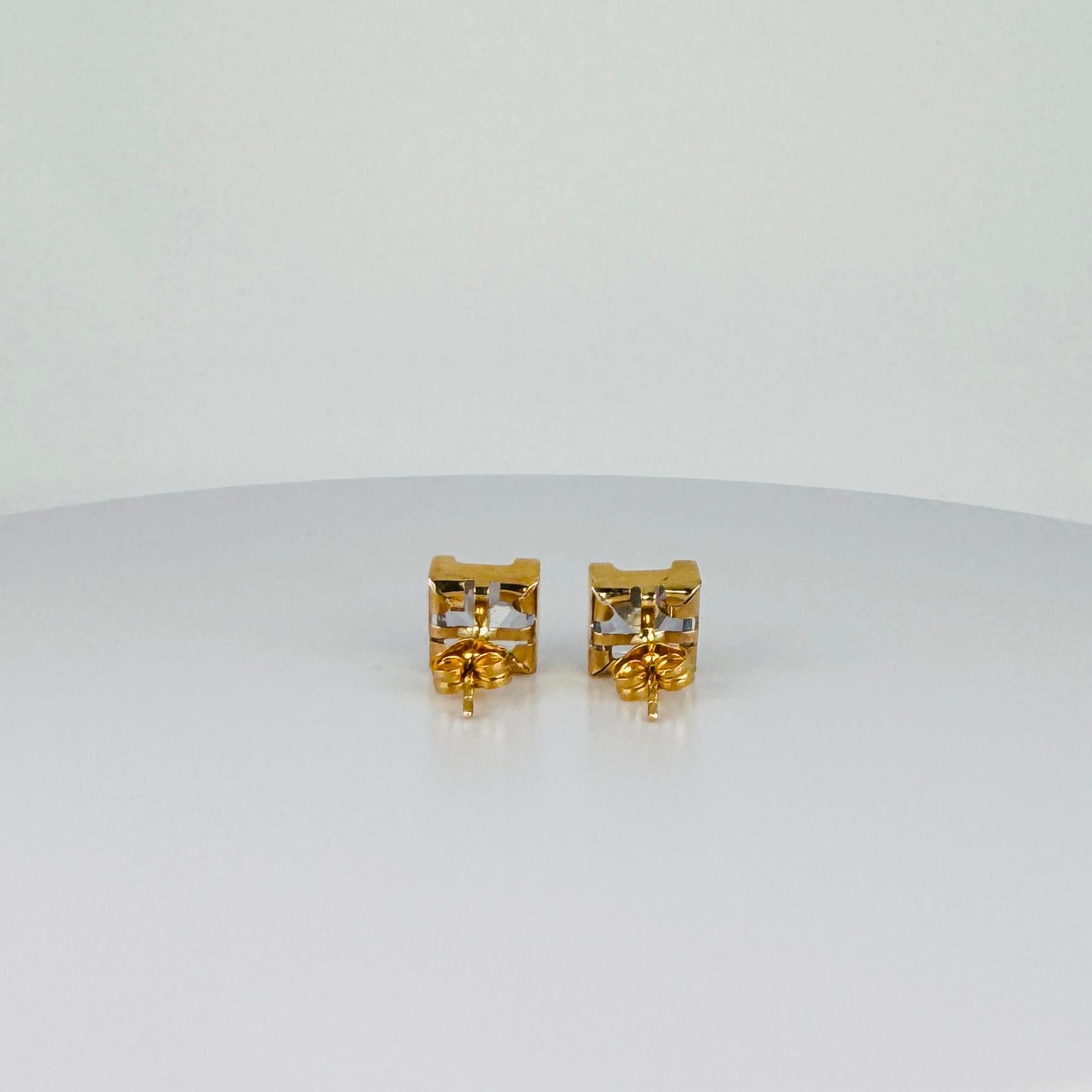 Women's 18 carat yellow gold earrings with square faceted aquamarines 4 carat