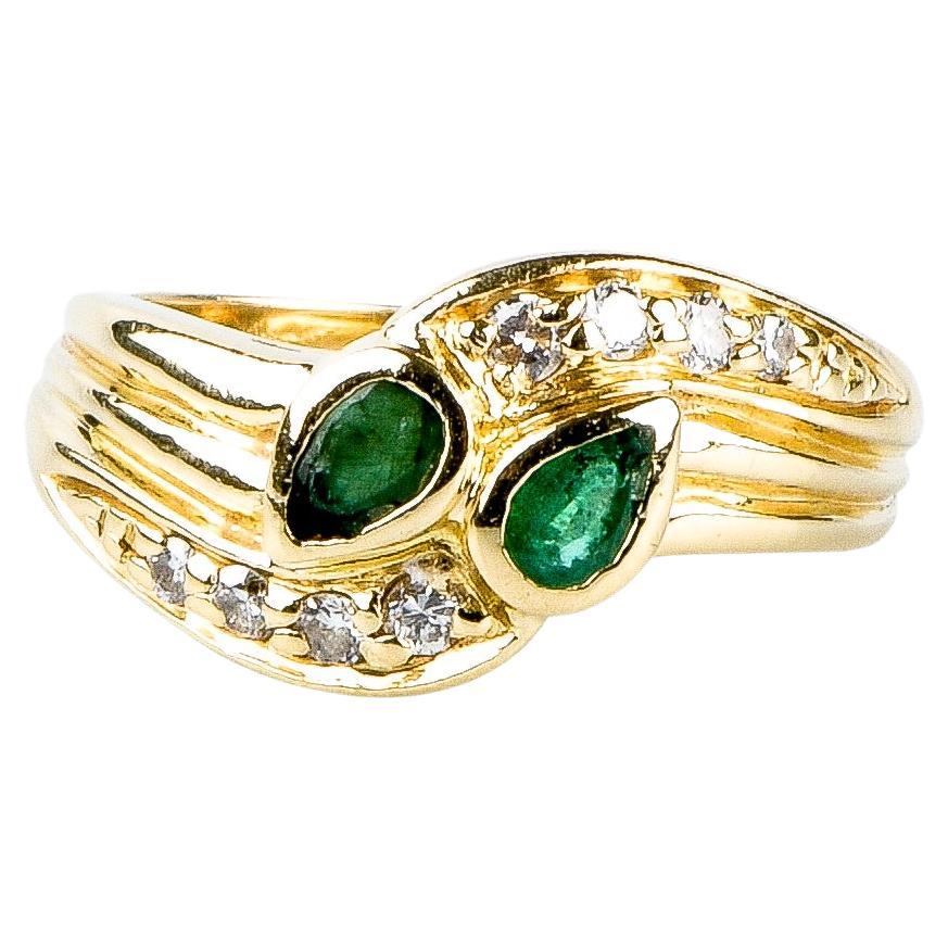 18 carat yellow gold emeralds diamonds ring For Sale