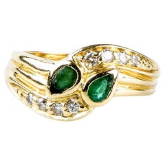 18 carat yellow gold emeralds diamonds ring