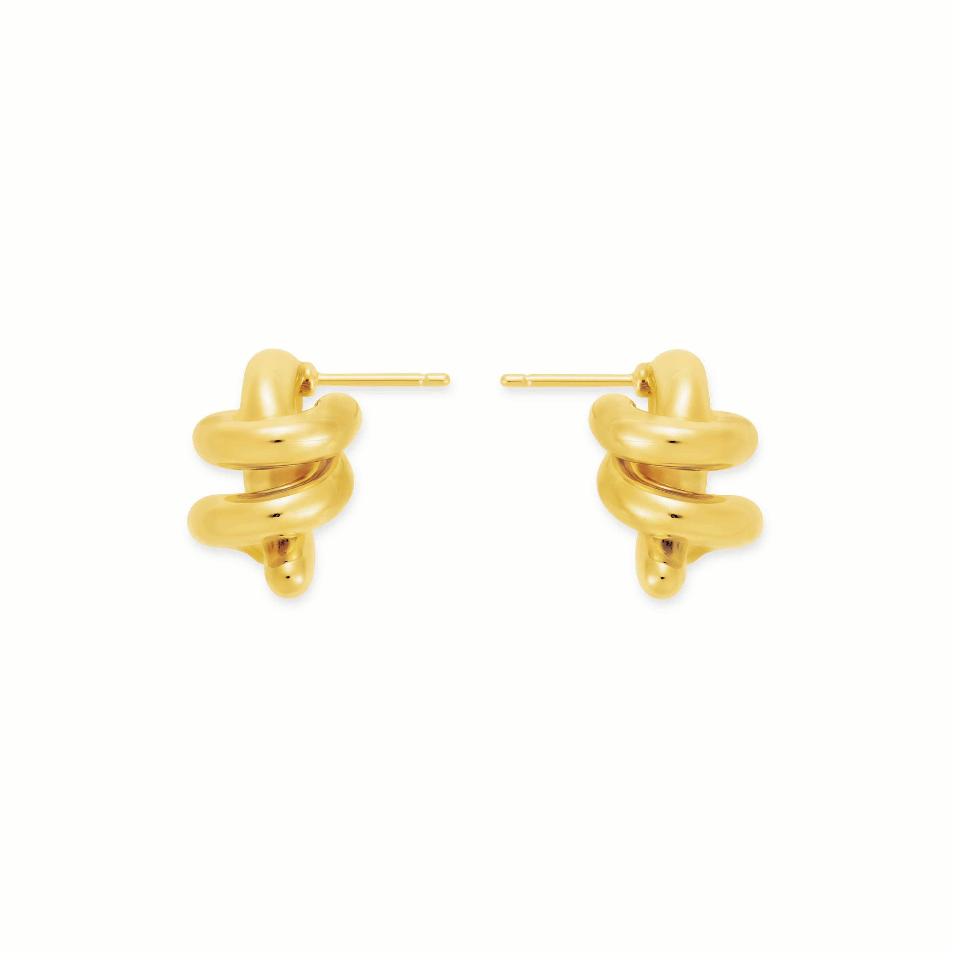 Mistova's Gold Expansion Earrings are inspired by sculptural forms. These earrings are made from 18k gold and have a hollow structure, providing the wearer comfort. Made from 18K gold.

