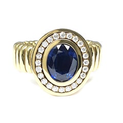 18 Carat Yellow Gold Flex Ring with an Oval sharpened Sapphire of 3.52 Carat