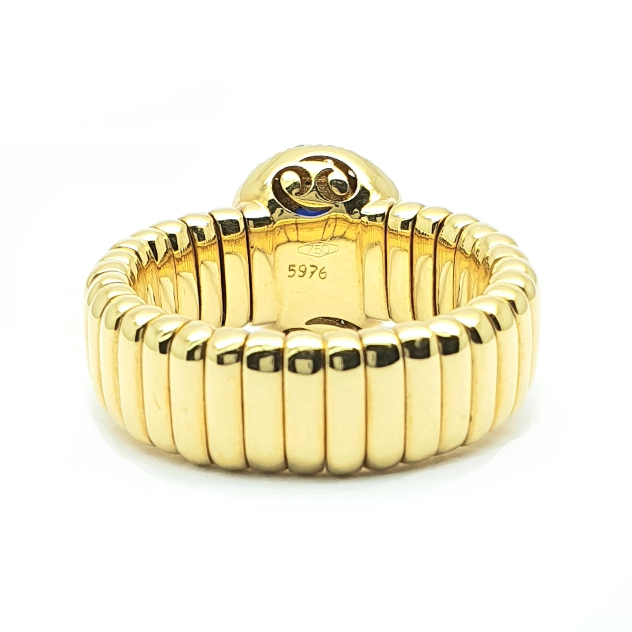 Contemporary 18 Carat Yellow Gold Flexring with a 3.06 Carat Sapphire and Diamonds Around For Sale