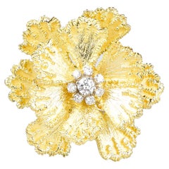 18 carat yellow gold flower ring designed with 0.46 carat diamonds