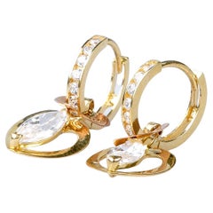 18 carat yellow gold heart zirconium oxides earrings