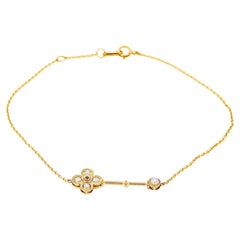 18 Carat Yellow Gold Key Bracelet with Pearl Detail
