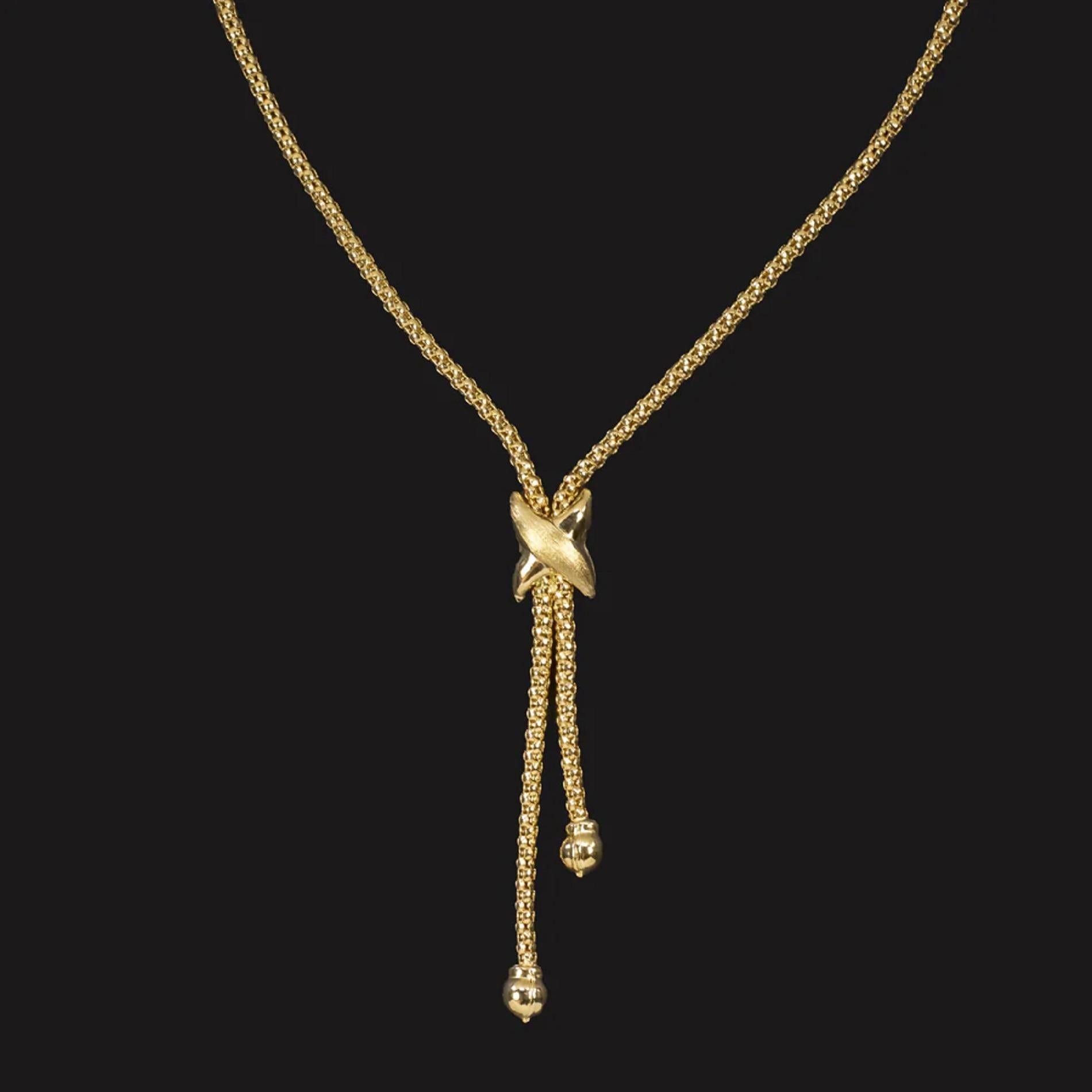 This 18k yellow gold lariat necklace has a classic design that will add a luxurious touch of gold to any outfit!

Highlights:

- Solid 18k yellow gold

- Classic elegance