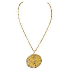 18-carat yellow gold necklace with a 18-carat yellow gold medallion pendant 