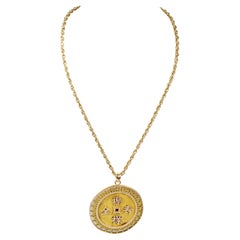 18-carat yellow gold necklace with a 18-carat yellow gold medallion pendant