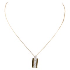 18-carat yellow gold necklace with a pendant 12 diamonds of 0.12 carats in total