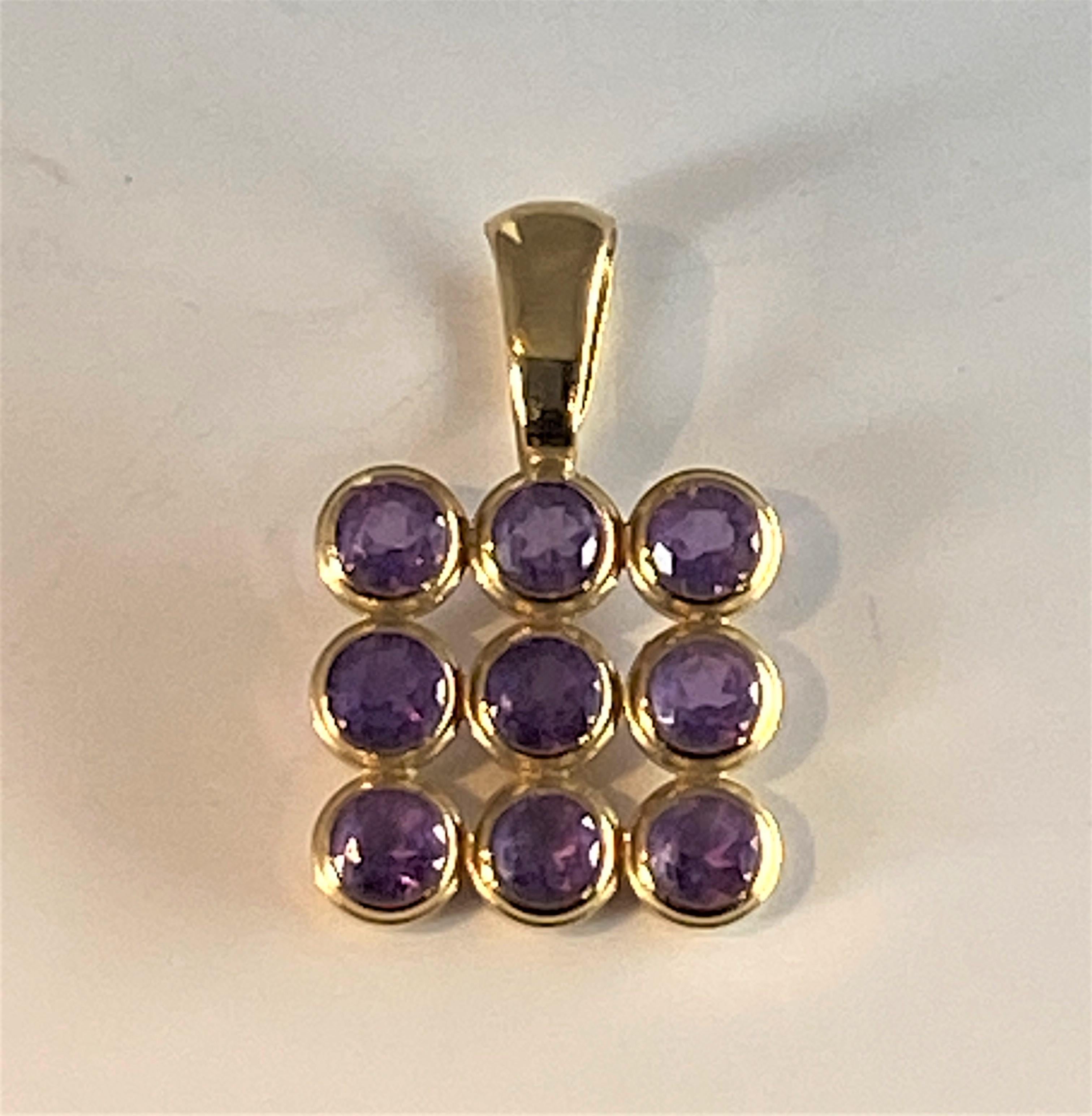 Women's or Men's 18 Carat Yellow Gold Pendant Set with 9 Amethysts For Sale