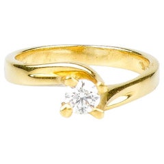 18 carat yellow gold ring designed with 0.35 carat diamond
