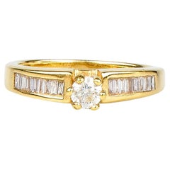 18 carat yellow gold ring designed with 0.51 carat diamonds