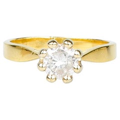 18 carat yellow gold ring designed with 0.90 carat diamond