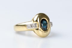 18 carat yellow gold ring designed with 4 pie-cut diamonds