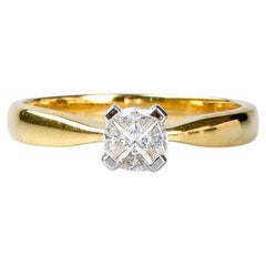 18 carat yellow gold ring designed with 4 pie-cut diamonds