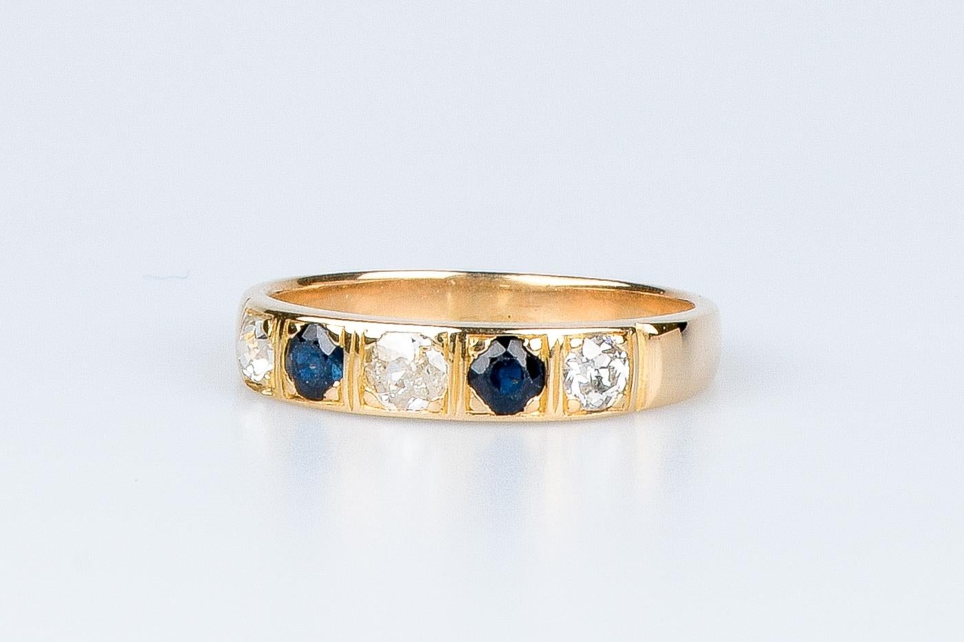 18 carat yellow gold ring designed with round brillant diamonds and sapphires For Sale 7