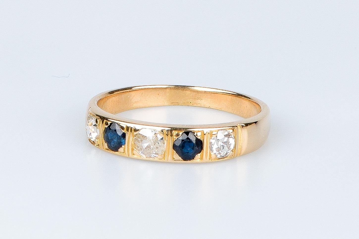 18 carat yellow gold ring designed with round brillant diamonds and sapphires For Sale 8