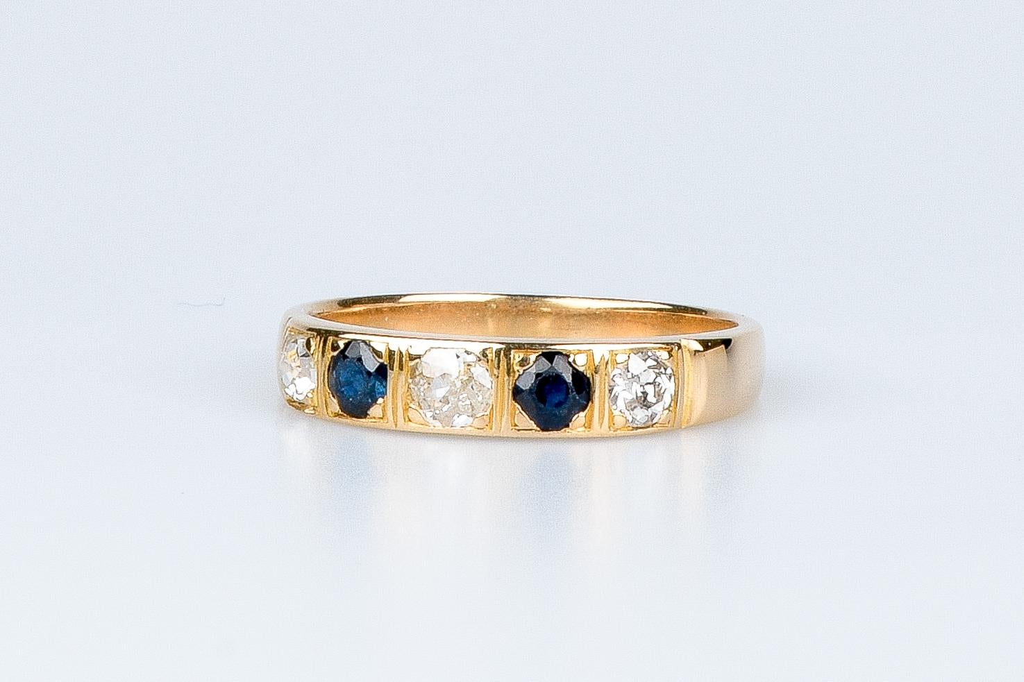 18 carat yellow gold ring designed with round brillant diamonds and sapphires For Sale 9