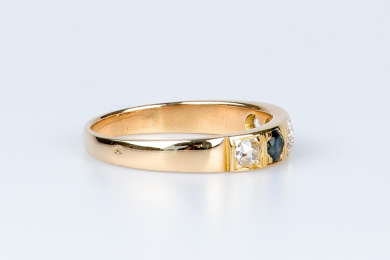 18 carat yellow gold ring designed with round brillant diamonds and sapphires For Sale 2