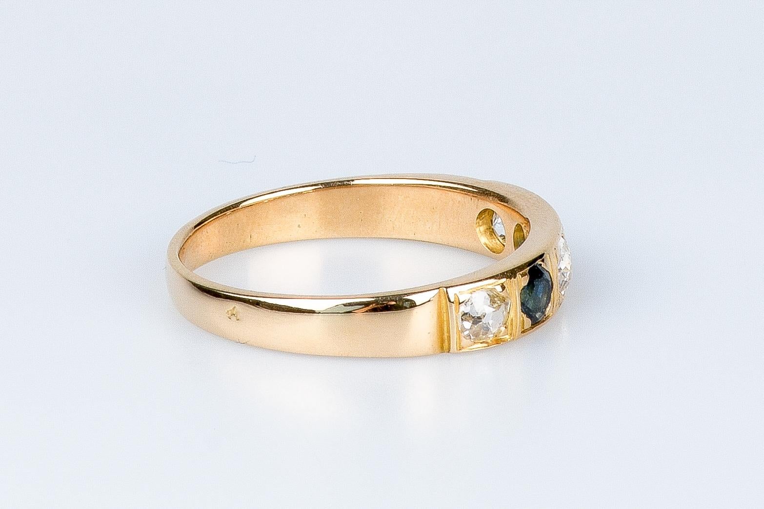 18 carat yellow gold ring designed with round brillant diamonds and sapphires For Sale 3