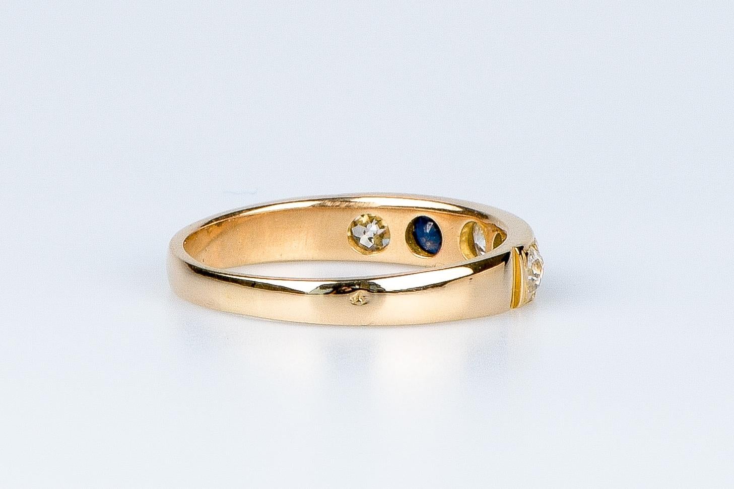 18 carat yellow gold ring designed with round brillant diamonds and sapphires For Sale 4