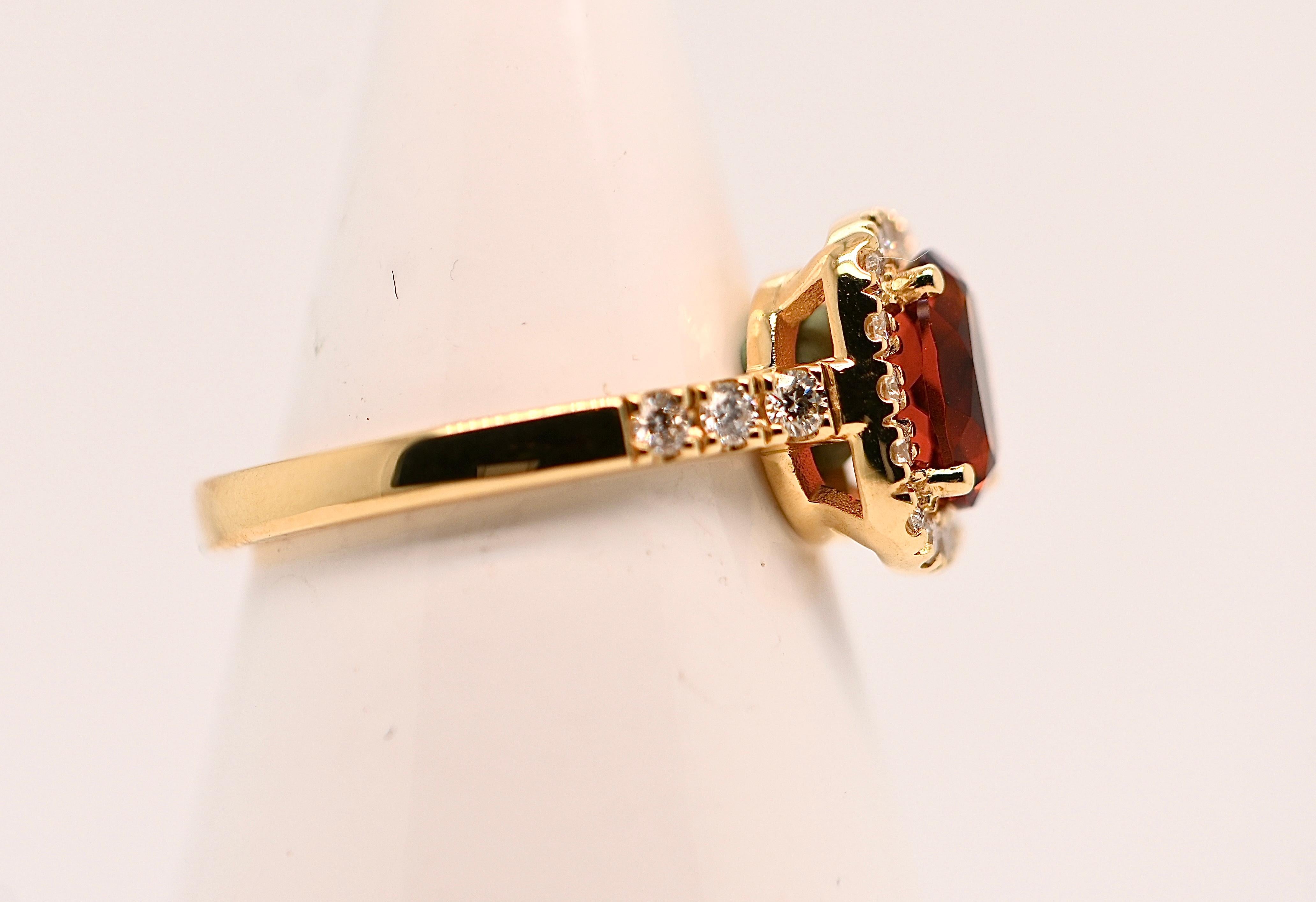 Indulge in the enchanting beauty of this 18-carat yellow gold ring, adorned with a stunning oval-cut citrine gemstone weighing 1.130 carats and boasting a radiant F color. Surrounding the citrine are 22 brilliant-cut diamonds totaling 0.470 carats,