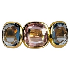 18 carat yellow gold ring with pink amethyst and blue spinel