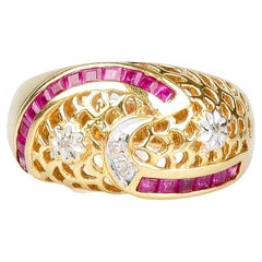 Ring aus 18 Karat Gelbgold mit Rubinen und Diamanten