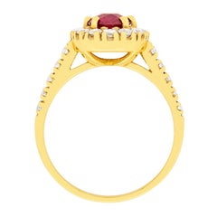 18 Carat Yellow Gold Ruby and Diamond Halo Ring